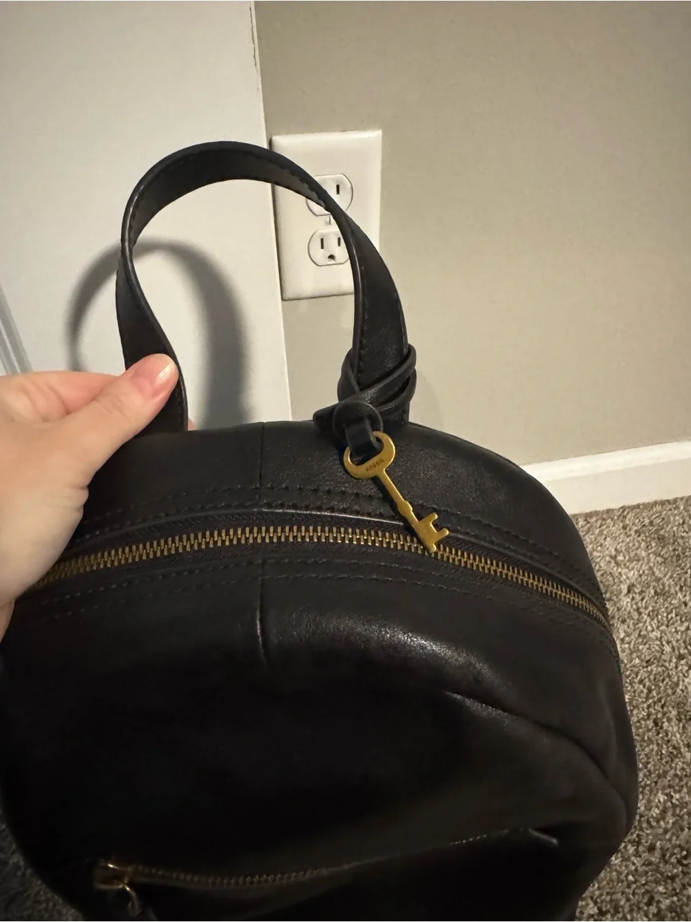 Fossil Black Leather Backpack with Gold Zip Accent